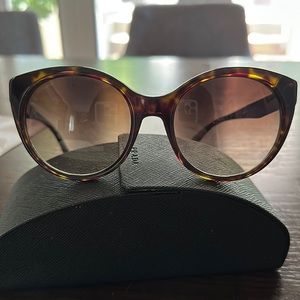 Prada cat eye sunglasses. Gently used with case.